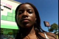 Ebony Babe Sucks on a Dick Image