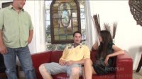 Hot Brunette Gets Banged by Two Guys on the Couch Image