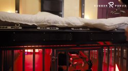 'Rubber Nights: The Rubber Slave Tight in a Cage Under the Bed' screenshot nº 49