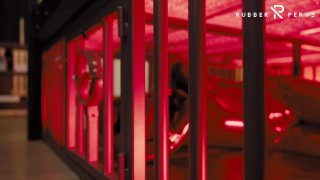Rubber Nights: The Rubber Slave  Tight in a Cage Under the Bed