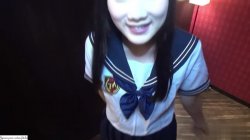 Captura de 'A Beautiful Black Haired College Girl Cosplaying in a School Uniform' nº 1