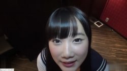Captura de 'A Beautiful Black Haired College Girl Cosplaying in a School Uniform' nº 2