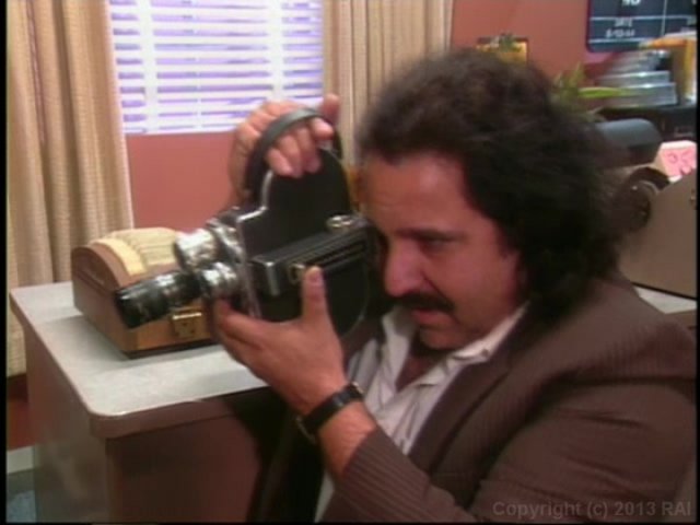 Blonde Babes Making Love while Ron Jeremy Records Them Image