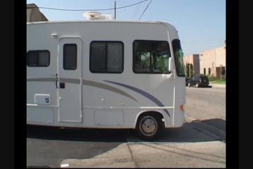 Blonde MILF Gets DP'd in the RV Screenshot