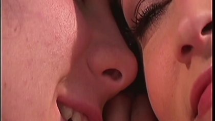 Lesbian babes suck on each other tits on balcony