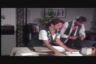 Red Haired Beauty Gets Fucked on the Office Desk