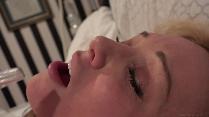 Slender Stacked Blonde Beauty Kayden Kross Sucks on a Hookah while Straddling Director Manuel Ferrara and Toying with His Huge Uncut Cock Image