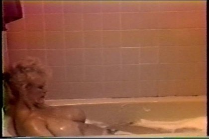 Big Boobed Blonde Rubs Her Horny Pussy