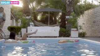 Lesbian Double Headed Dildo Action By The Pool Screenshot