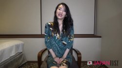 'Tomoko, in a dimly lit room, spreads her legs, exposing her bushy cunt before sex' screenshot nº 16