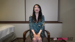 'Tomoko, in a dimly lit room, spreads her legs, exposing her bushy cunt before sex' screenshot nº 2